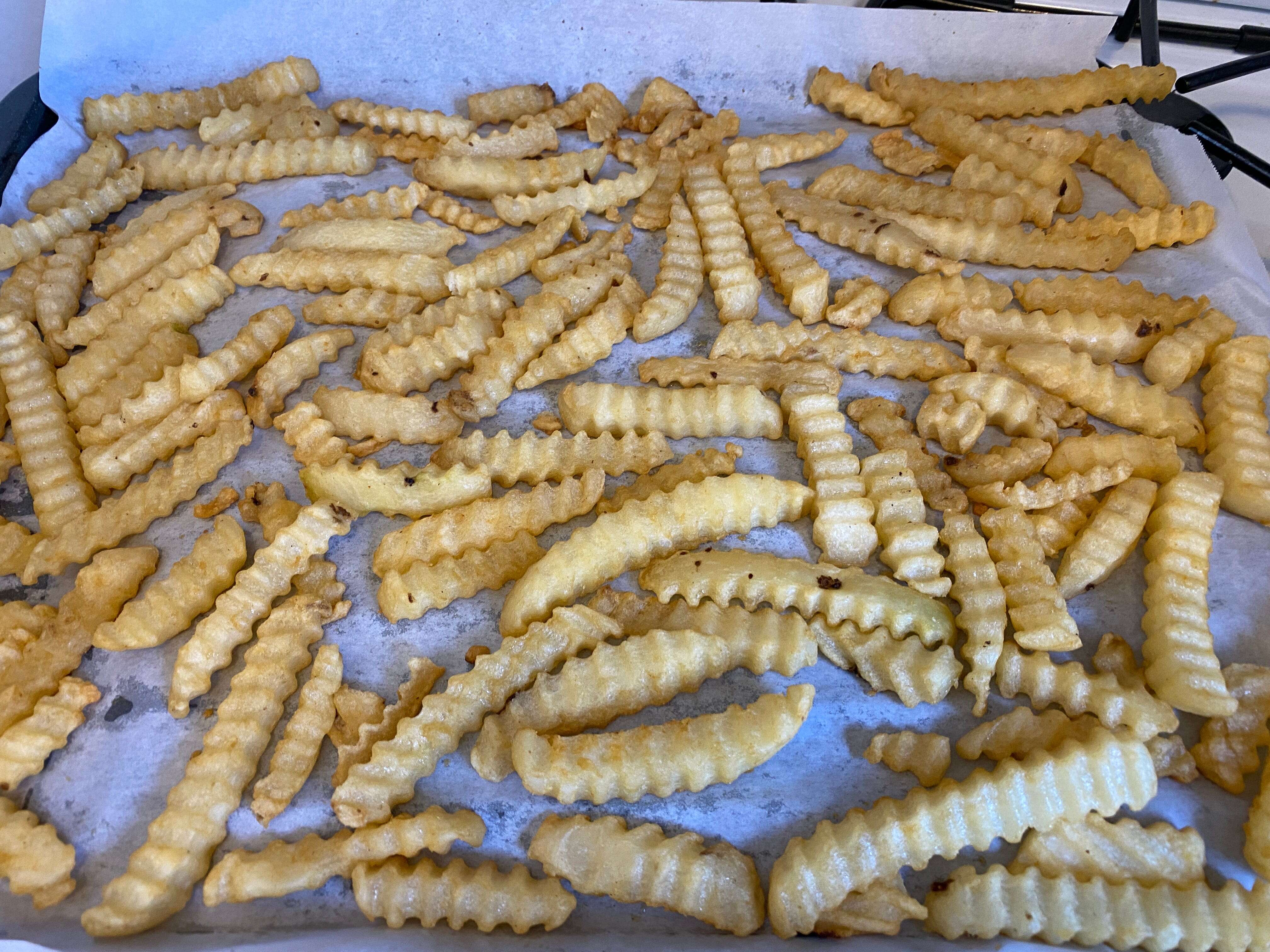 I tried 10 ways to make frozen fries better, and there are 9 hacks I'd absolutely do again