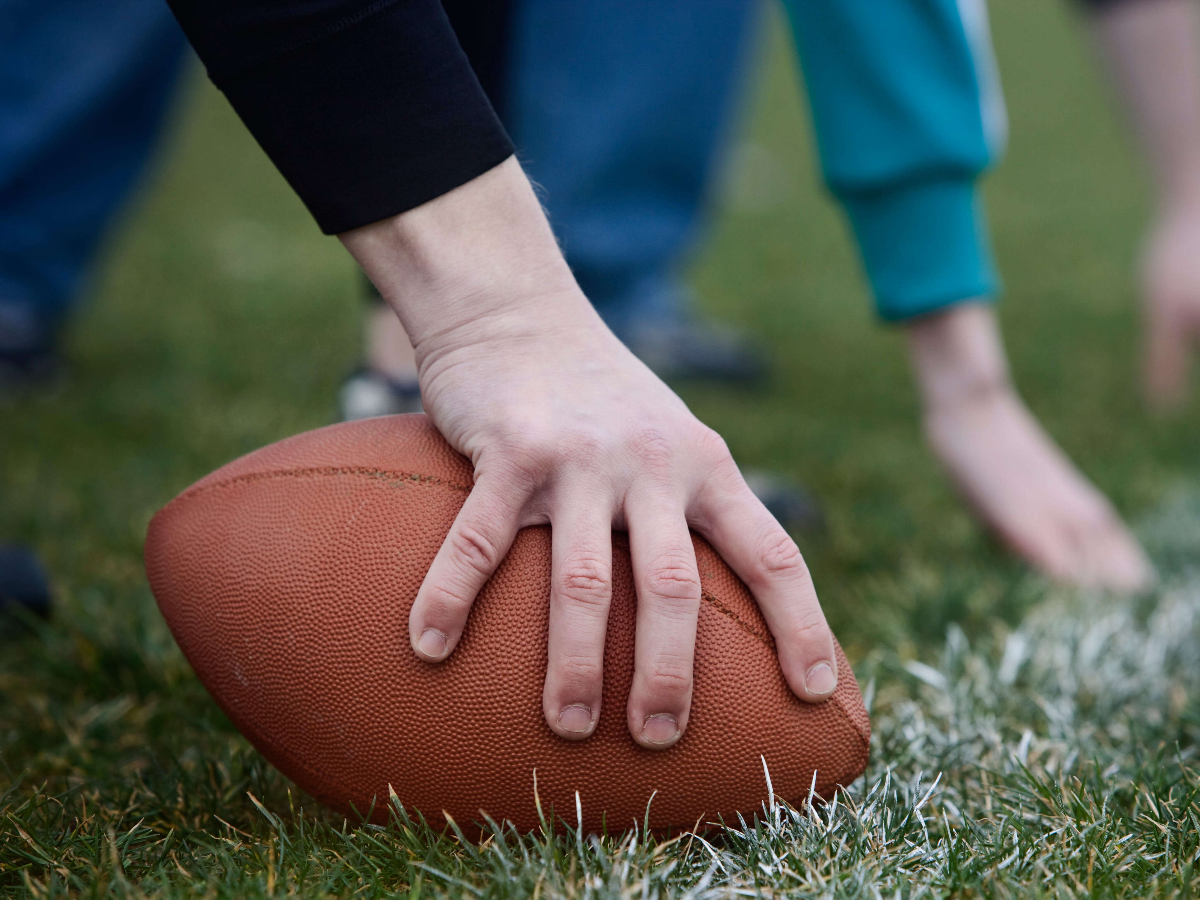 I'm terrified to let my son play tackle football. But he loves the game, so I signed him up for flag football as a compromise.