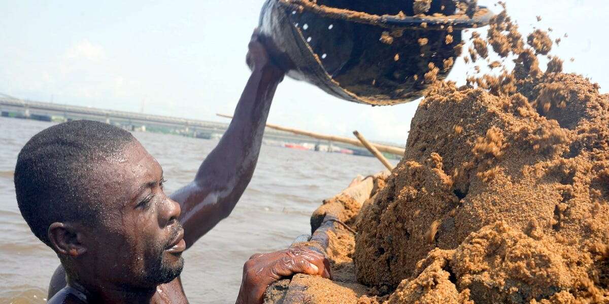 Why sand divers risk their lives 300 times a day for the world's most mined resource