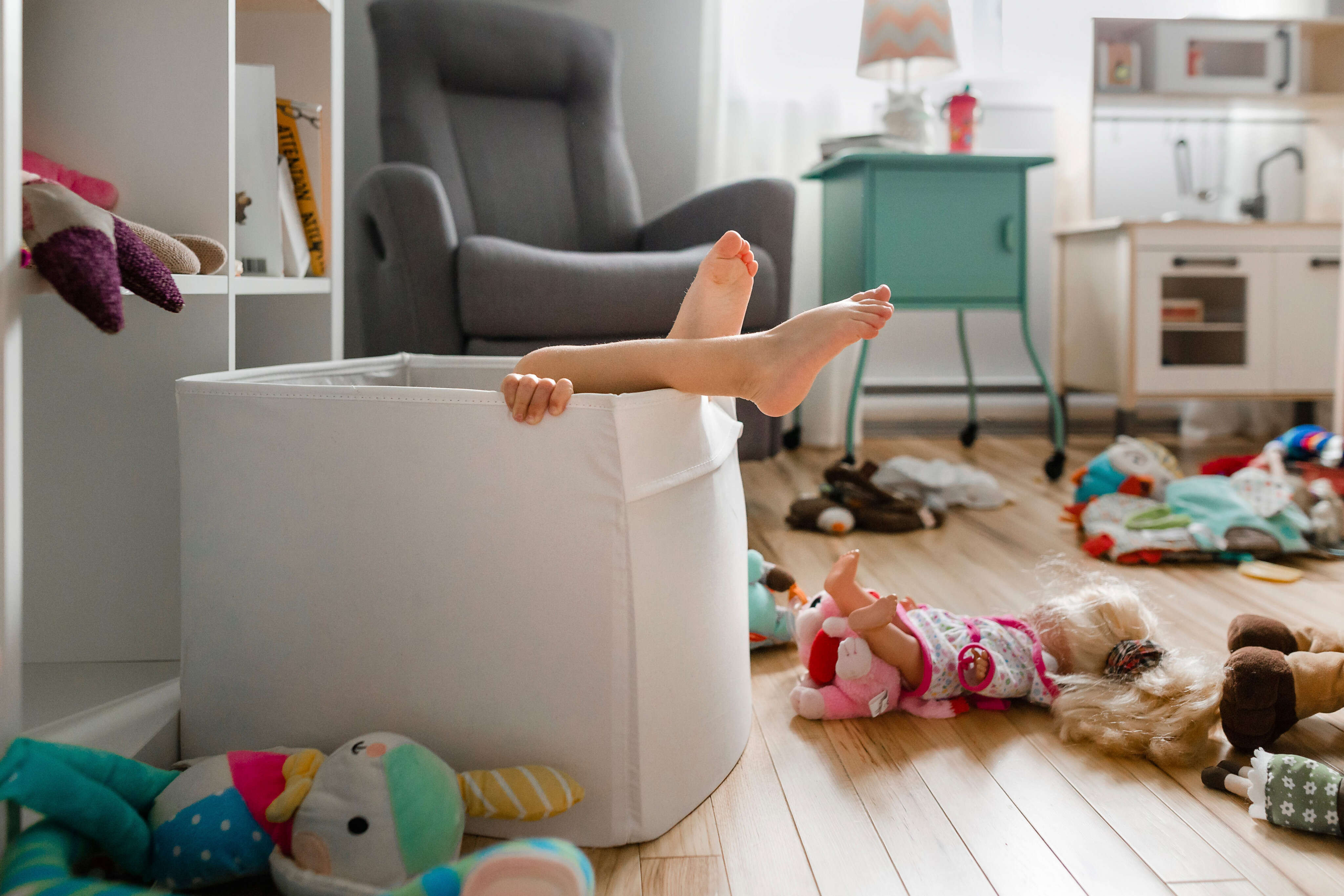 My decorating aesthetic is 'I have kids.' We keep toys, art supplies, and stuffed animals in our shared space so we have easy access to them and to each other.