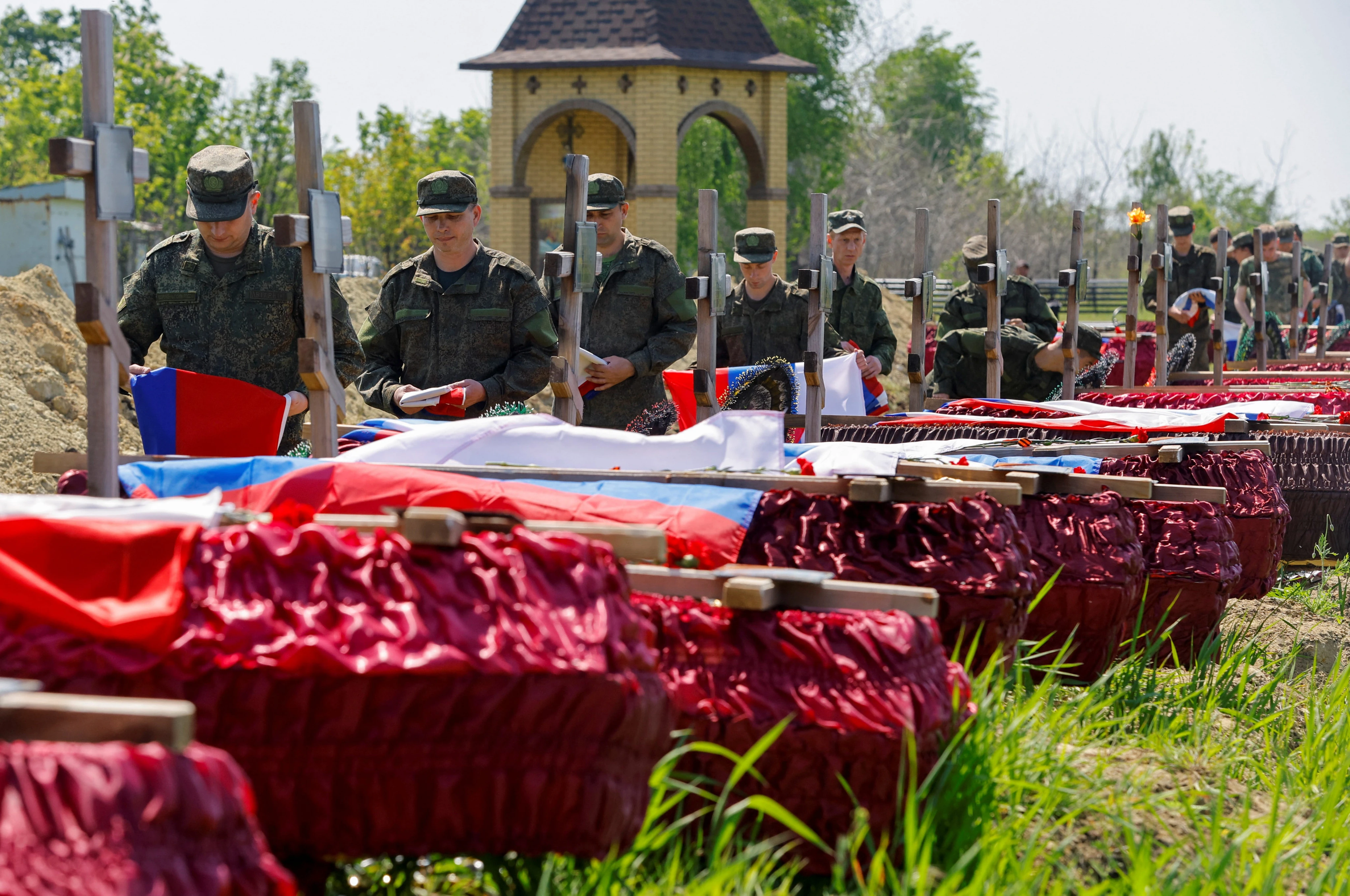 Russian soldier says he was told to burn the personal belongings ID'ing his dead comrades, a report says 