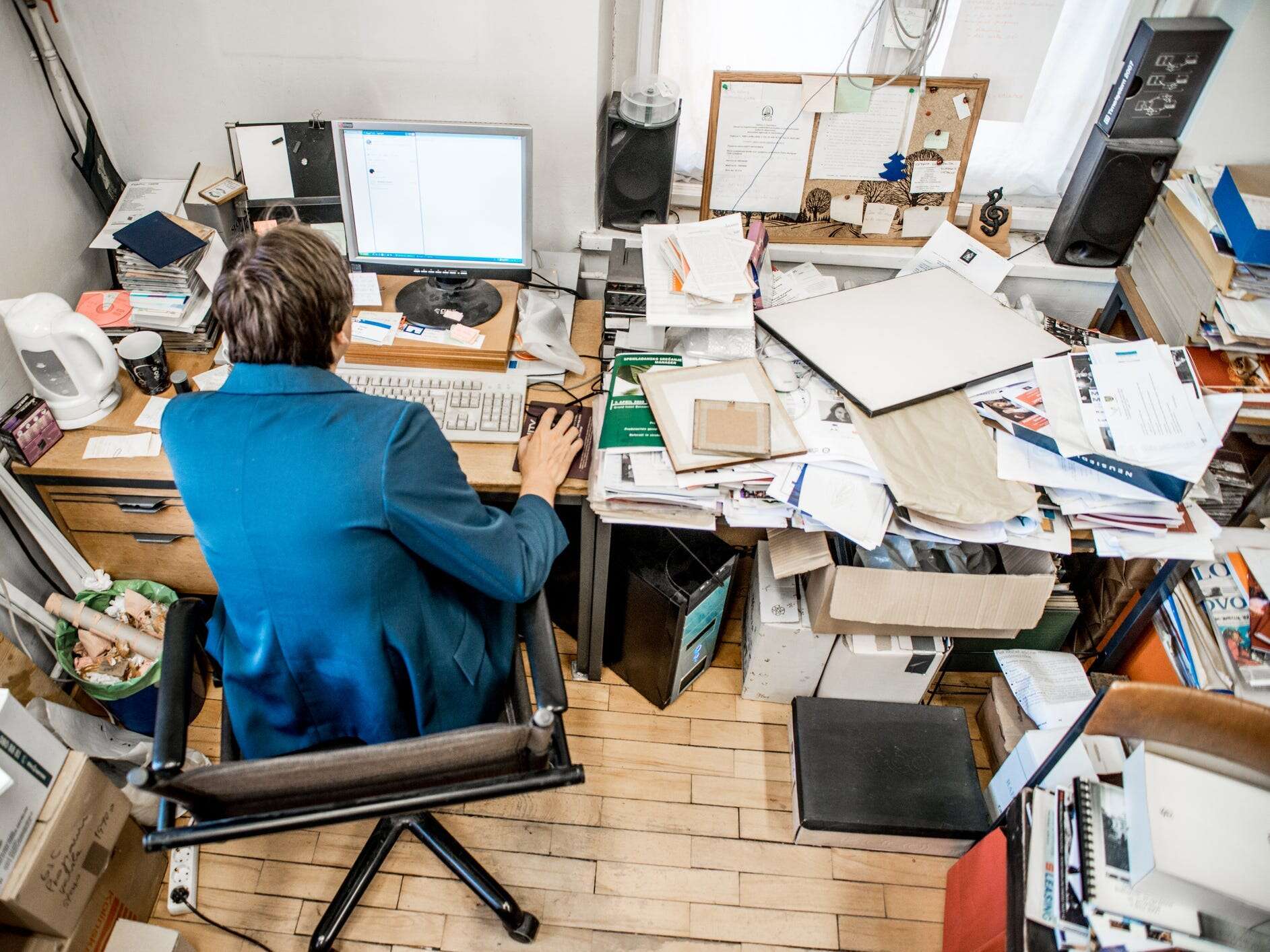 I'm a professional declutterer. Here's how to clean up your workspace so you can be more productive.