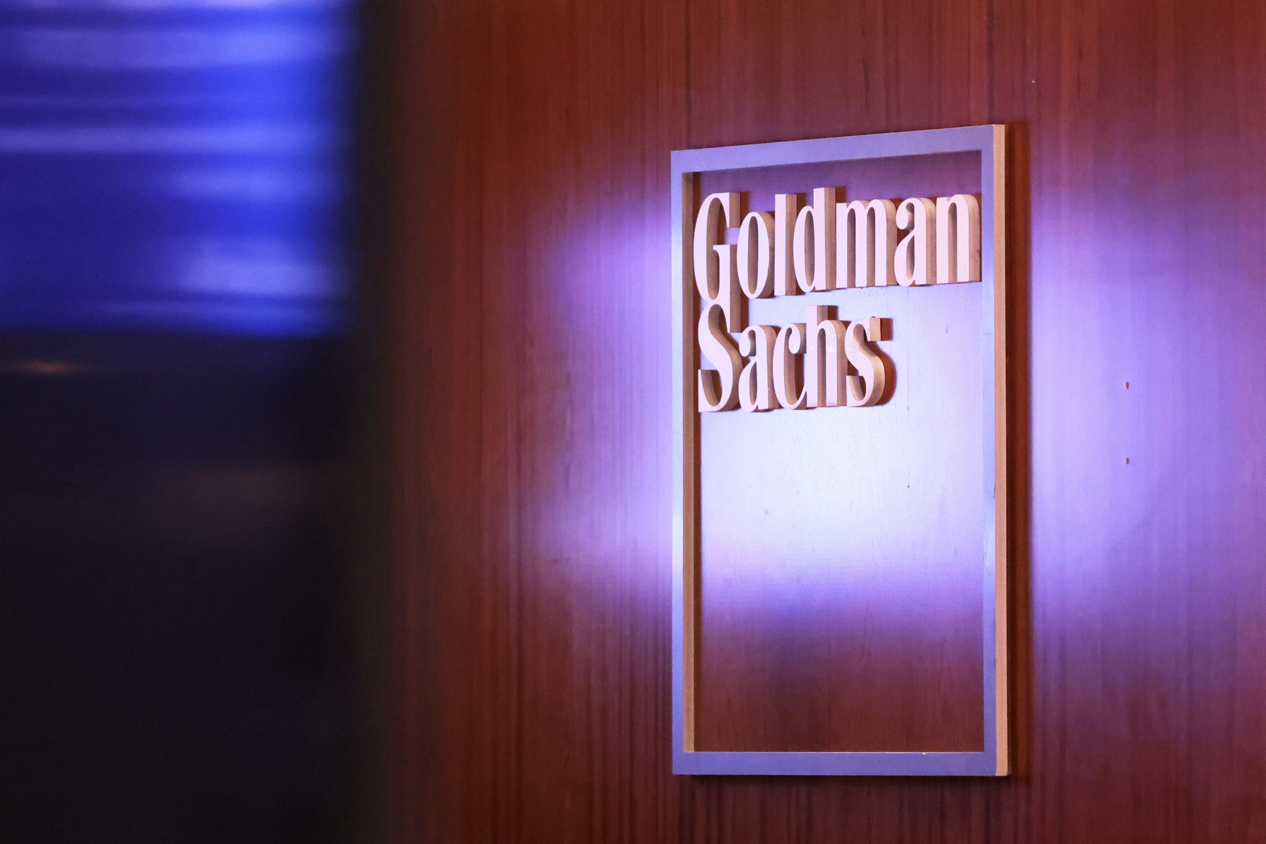 A top Goldman executive is leaving following reports that he wrote unauthorized posts critical of Trump