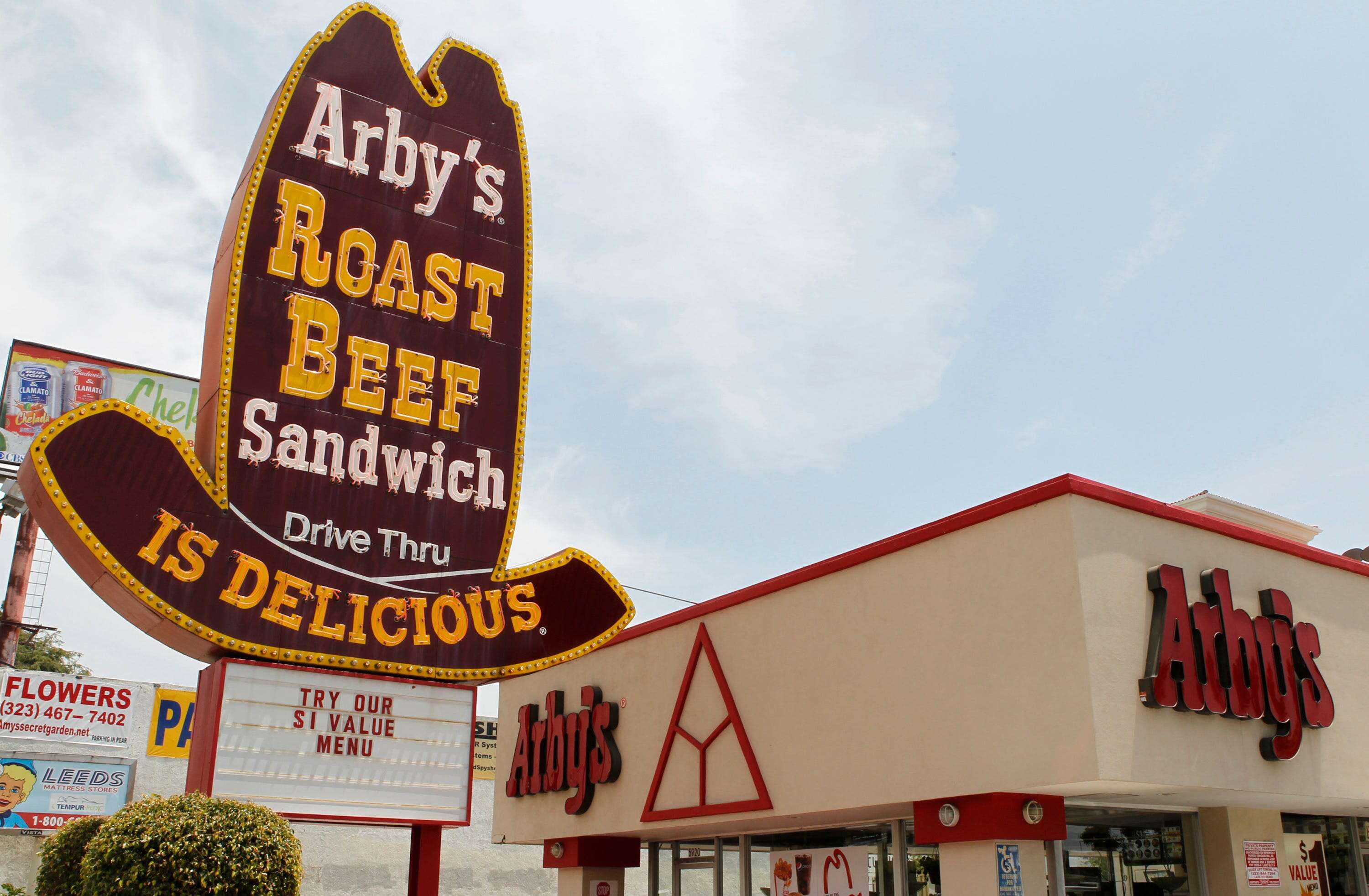 The 91-year-old owner of the iconic Hollywood Arby's has closed the restaurant after 55 years due to the pandemic and California's $20 minimum wage