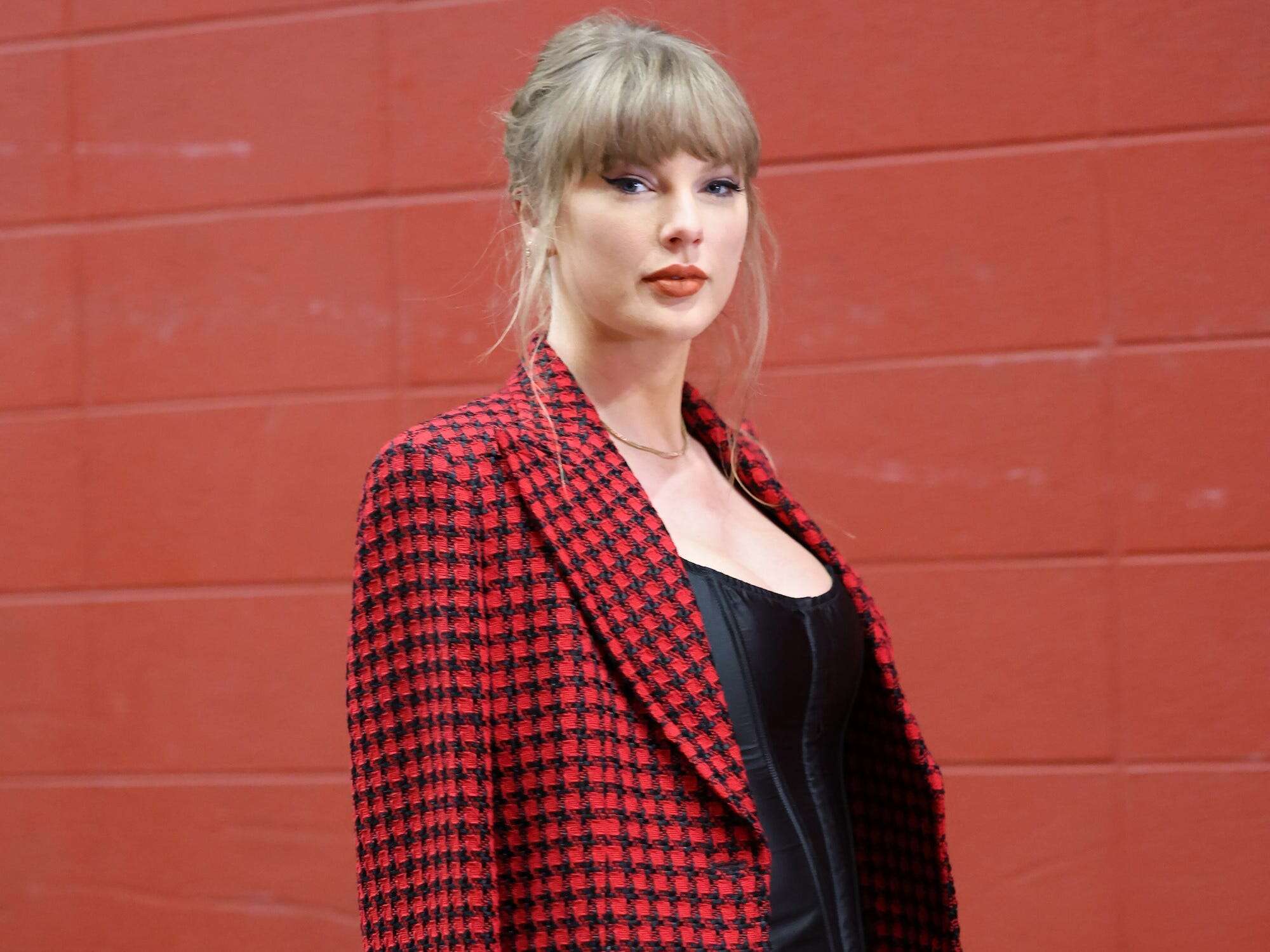 Taylor Swift mixed high and low fashion brands for her latest $100,000 gameday outfit