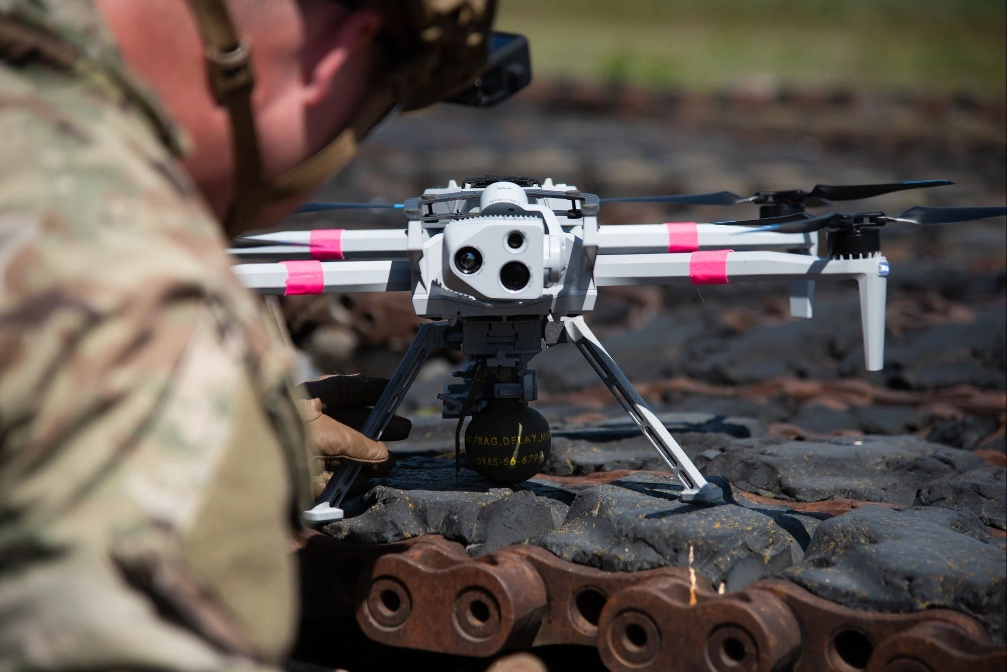 Video captures the US Army's first-ever test of grenade-dropping drones. They bombed vehicle targets.