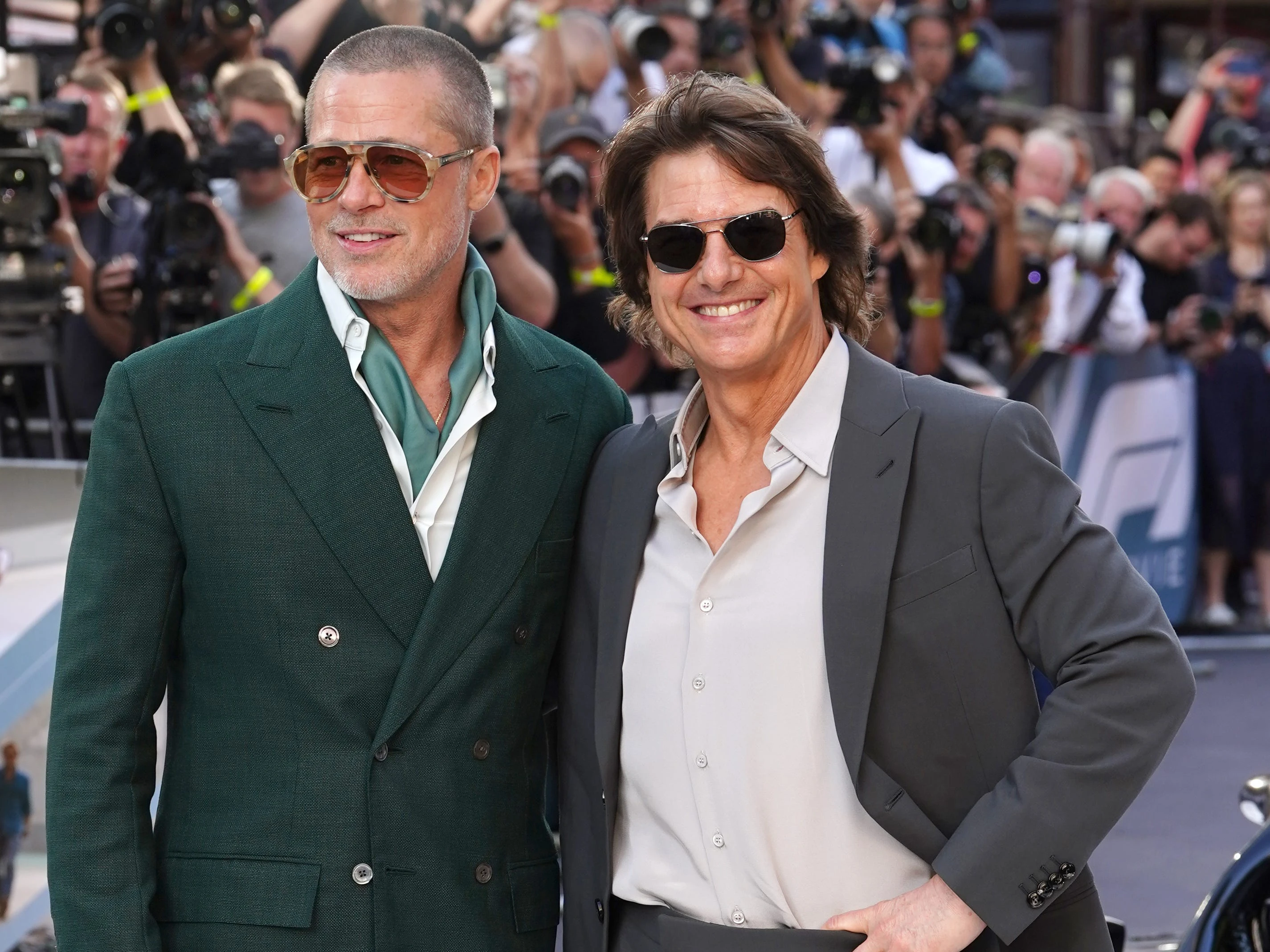 'F1' is Apple's first box office hit. Its director shared an idea for a crossover sequel featuring Tom Cruise.