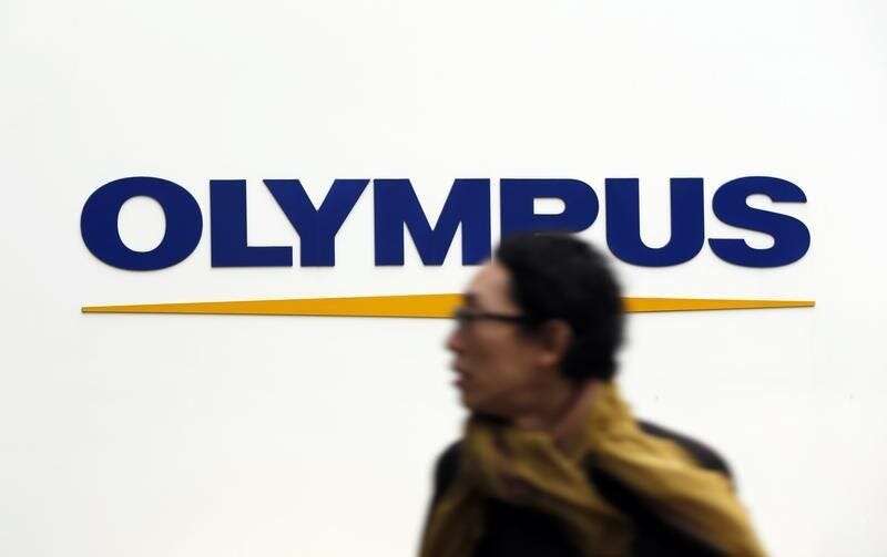 The CEO of optics giant Olympus has resigned after accusations he bought illegal drugs, sending its shares plummeting