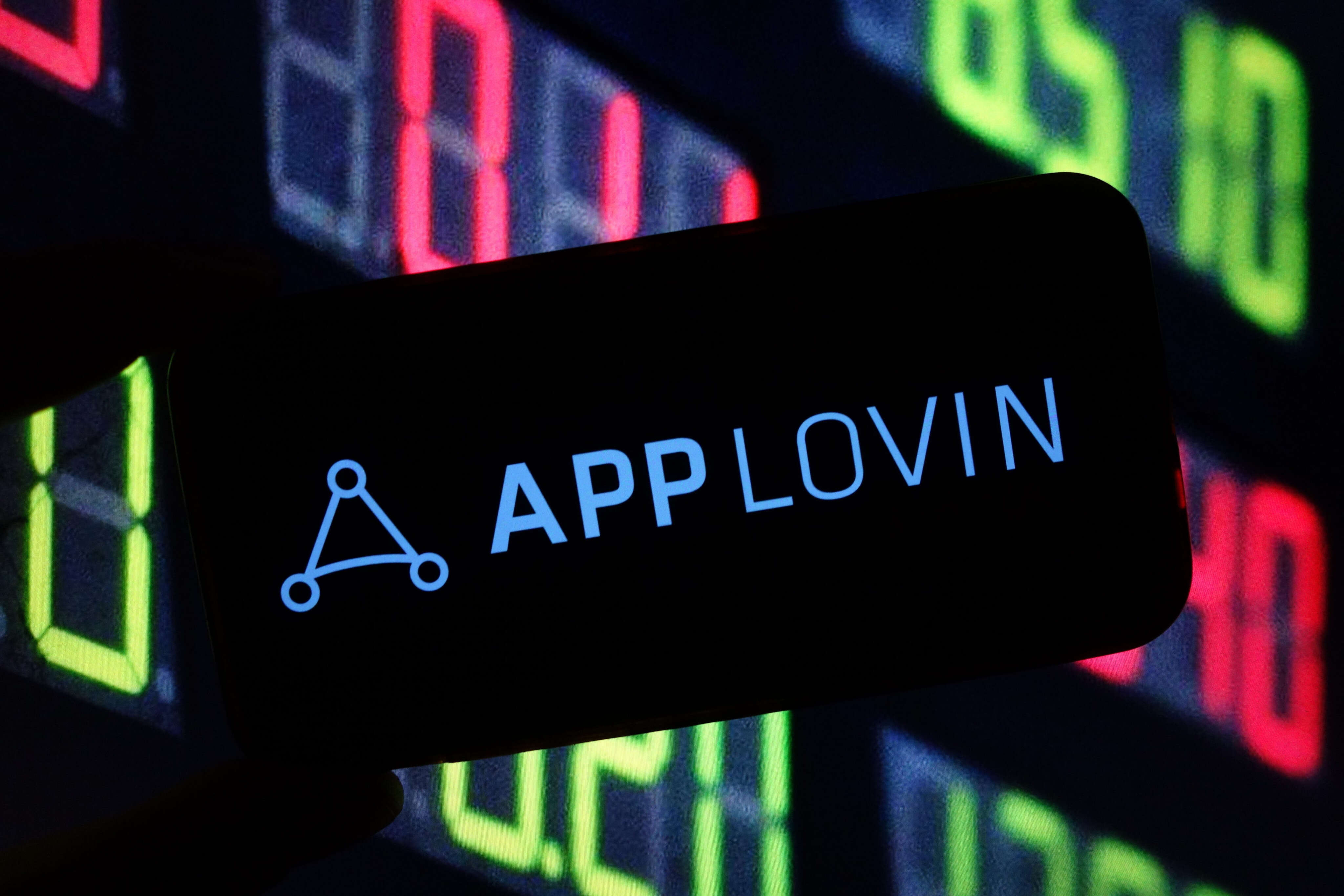 Adtech darling AppLovin is in talks to sell its gaming unit to Tripledot Studios in a $900 million deal, sources say