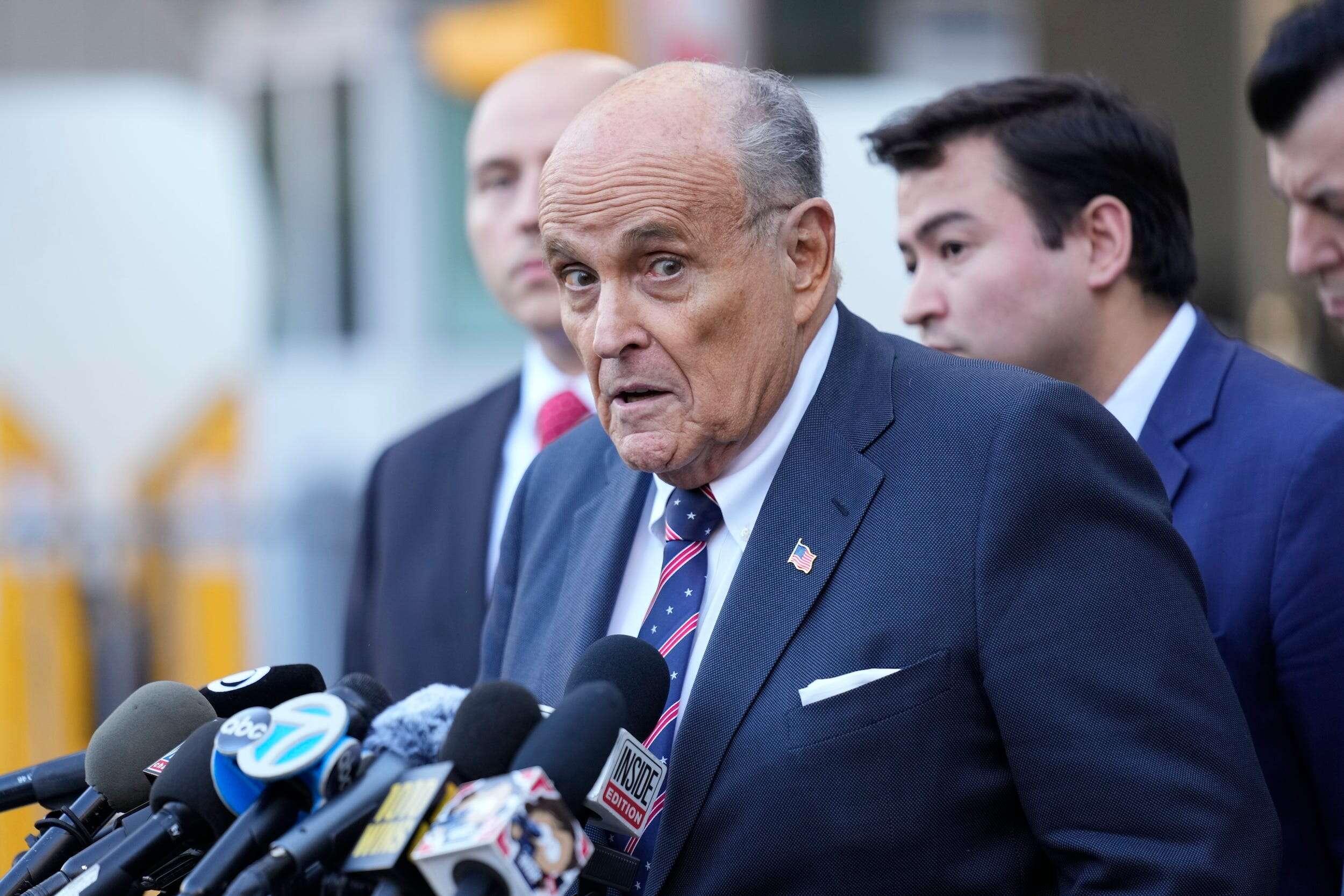 Giuliani says he can't surrender a Joe DiMaggio jersey in $148M defamation case because it's locked up in Ronkonkoma, NY