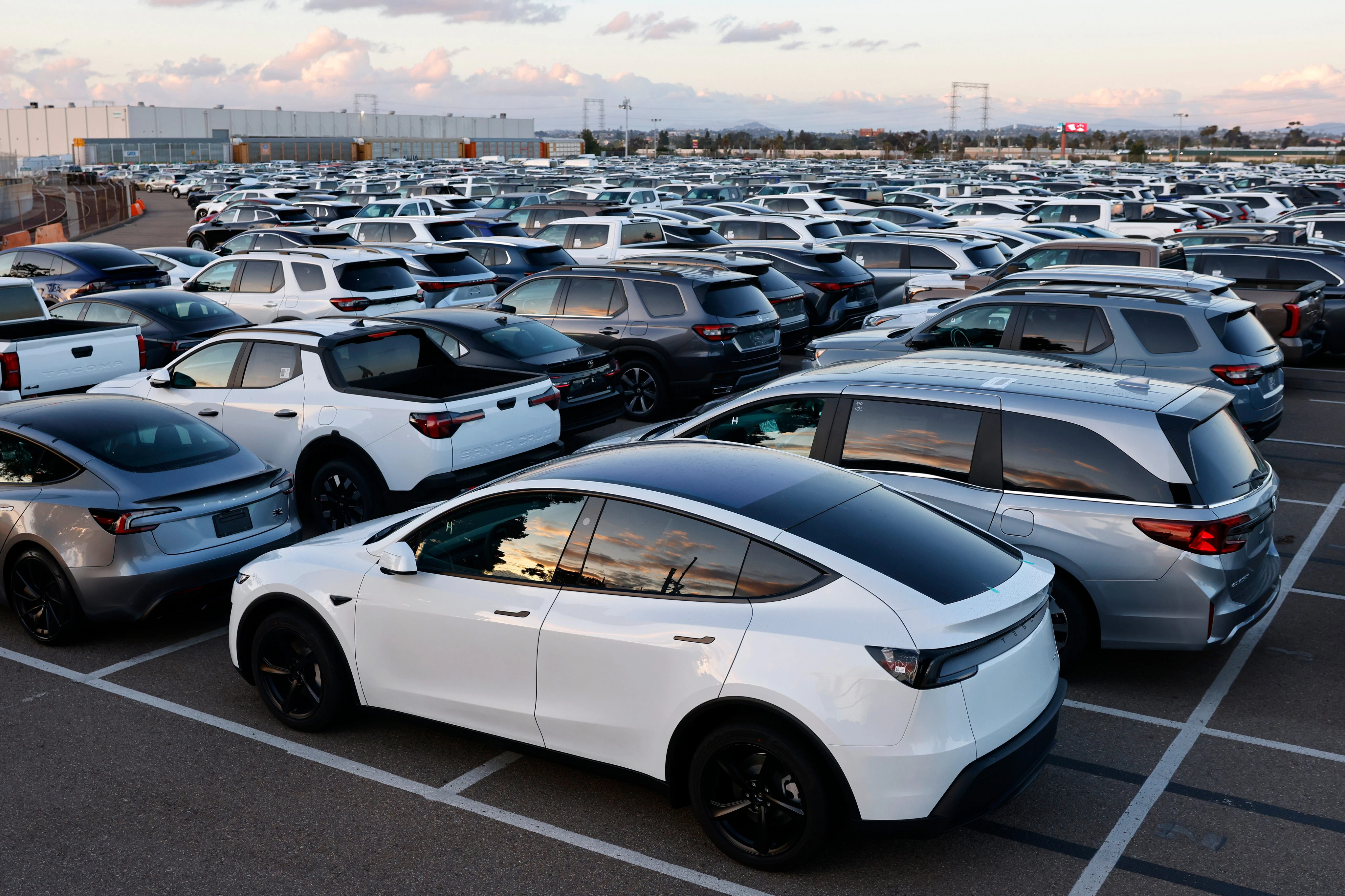 Global EV sales just hit a record, even as automakers tap the brakes