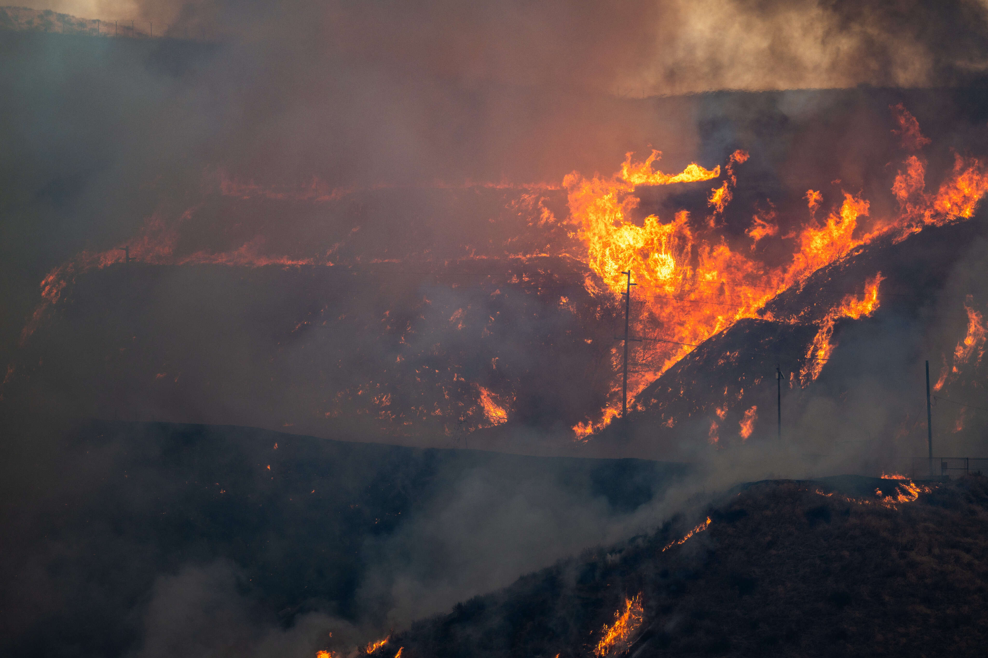 Fast-moving fire north of LA closes part of I-5 and frays nerves in California after back-to-back blazes