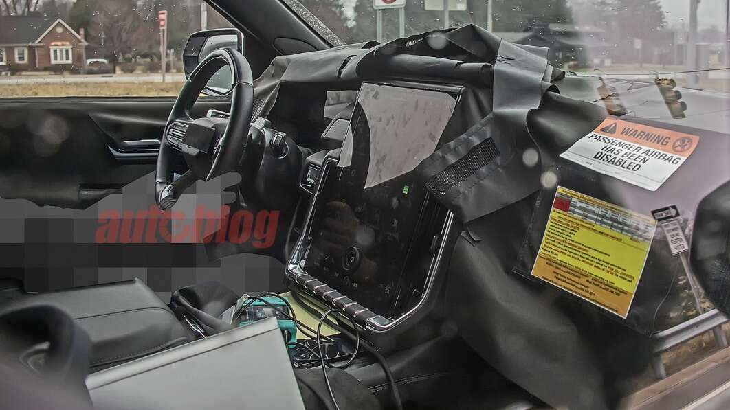 GMC Yukon spy shots show refresh with Acadia-style interior