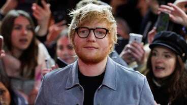 Ed Sheeran Aids Soccer Team Sign Player Before Performing With Taylor Swift