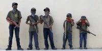 Mexican villages arm children as they vie for government's attention