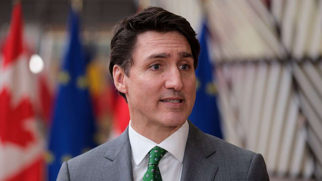 Trudeau tells Trump 'we will not back down' from trade war, calling tariffs 'very dumb'