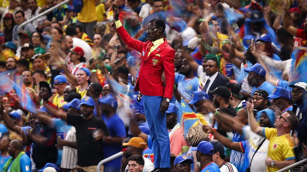 Why does this World Cup superfan stand like a statue every game