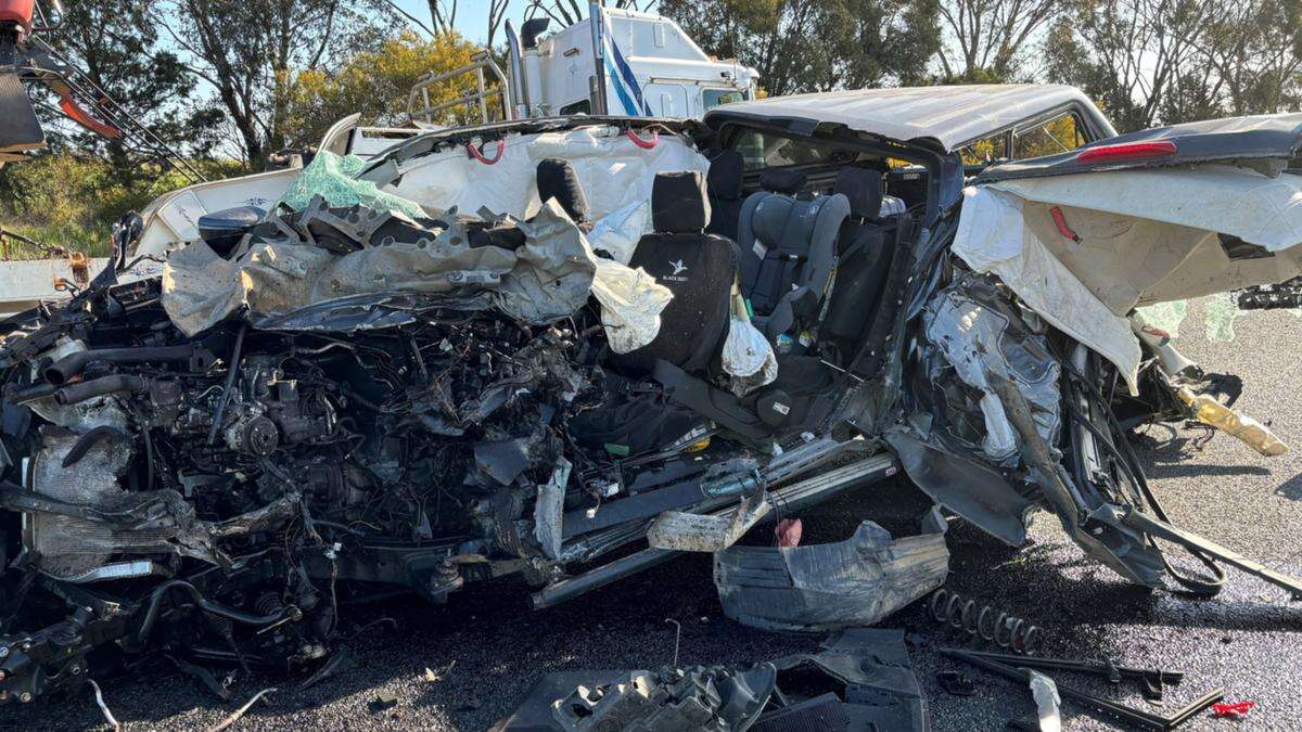 Child lucky to be alive after car crushed in crash with truck