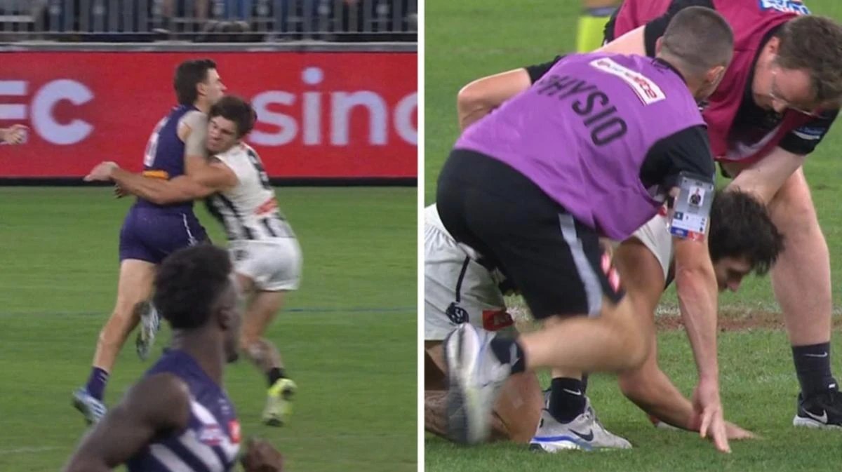 Scary scenes as Collingwood star stumbles after heavy hit