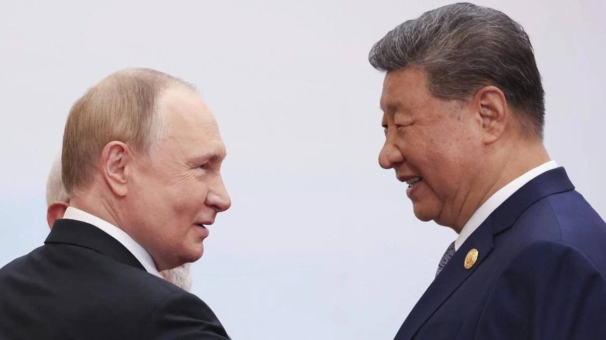 Car rides and hand-holding: Putin, Modi and Xi send Trump a pointed message