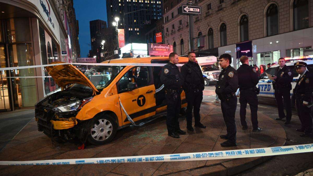 Australian mum and son among seven injured by taxi mounting kerb in New York