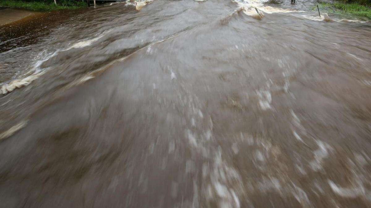 Men’s bodies swept kilometres by deadly floodwaters