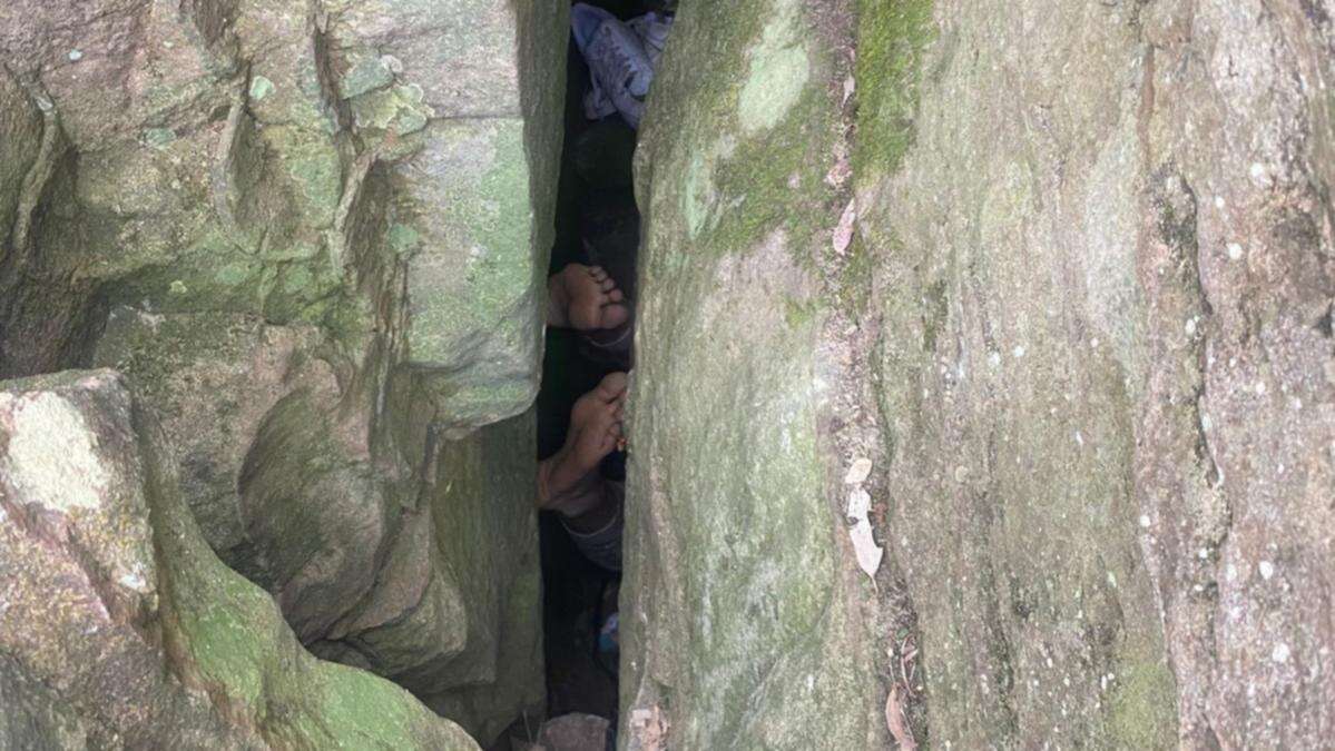 Woman trapped upside-down for seven hours in terrifying boulder accident