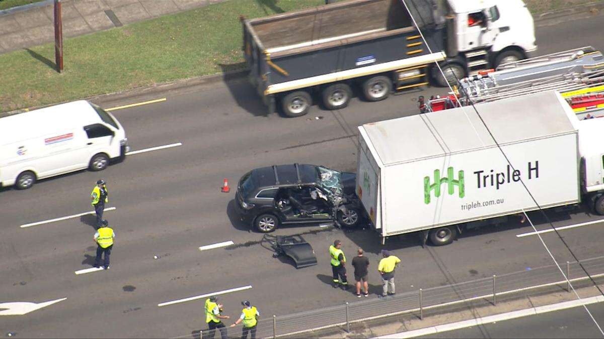 Man cut free from wreck after collision with truck in Sydney