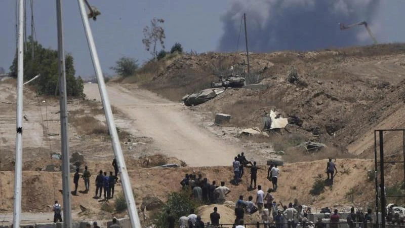 Dozens of Palestinians killed near aid point in third day of shooting