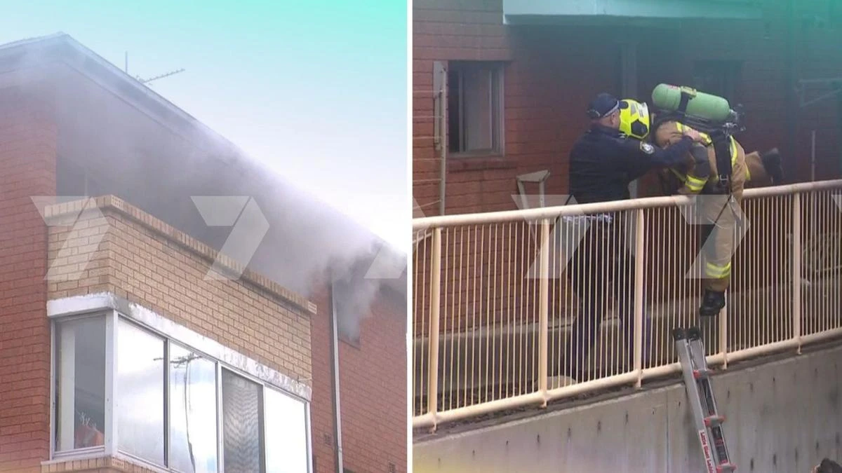 Woman dead after unit fire sends smoke pouring from windows