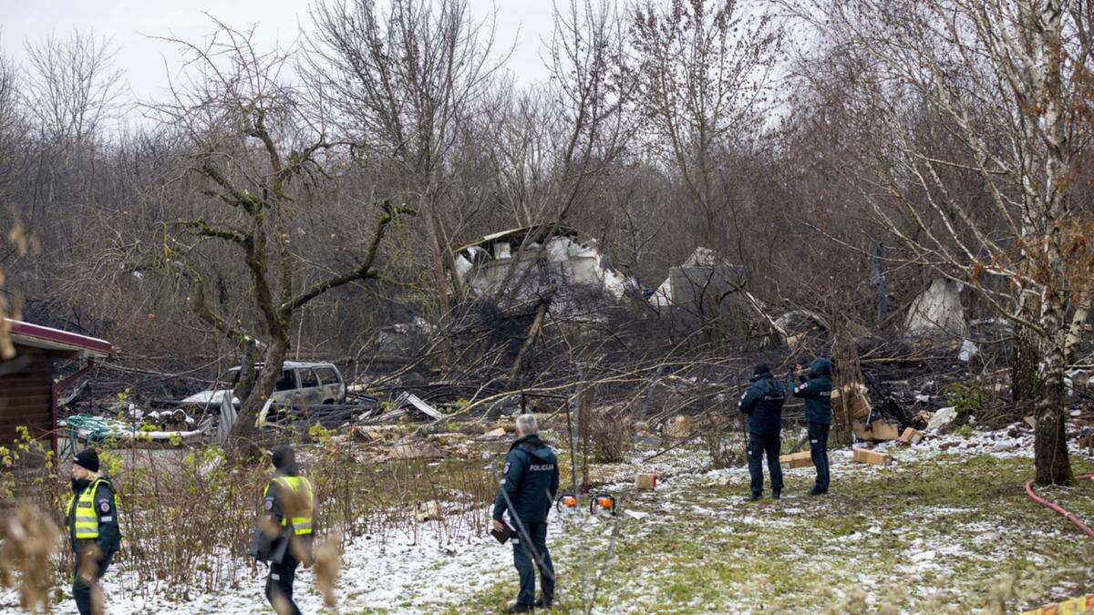 One dead as cargo plane crashes into home near airport