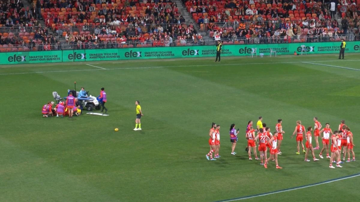 AFL match stopped 26 seconds in after player knocked out cold