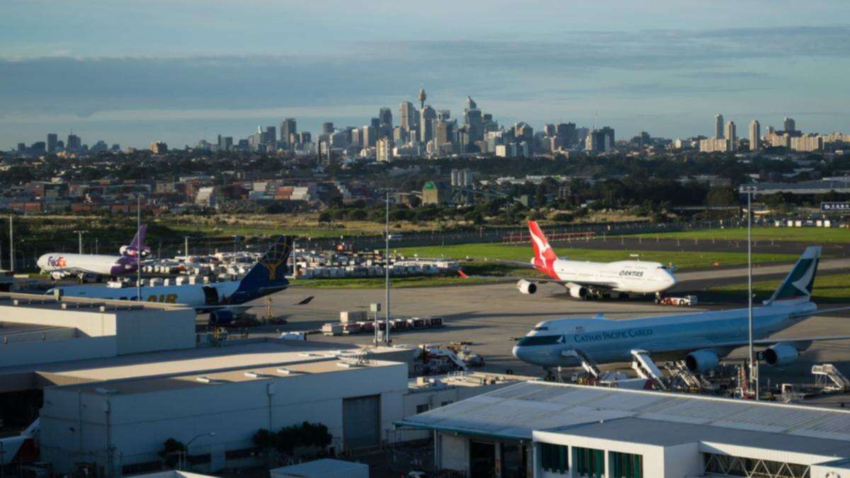 Terrifying comment heard on plane at Sydney Airport leads to arrest