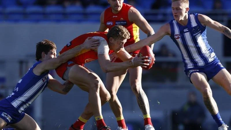 AFLKangaroos heap more AFL misery on Suns