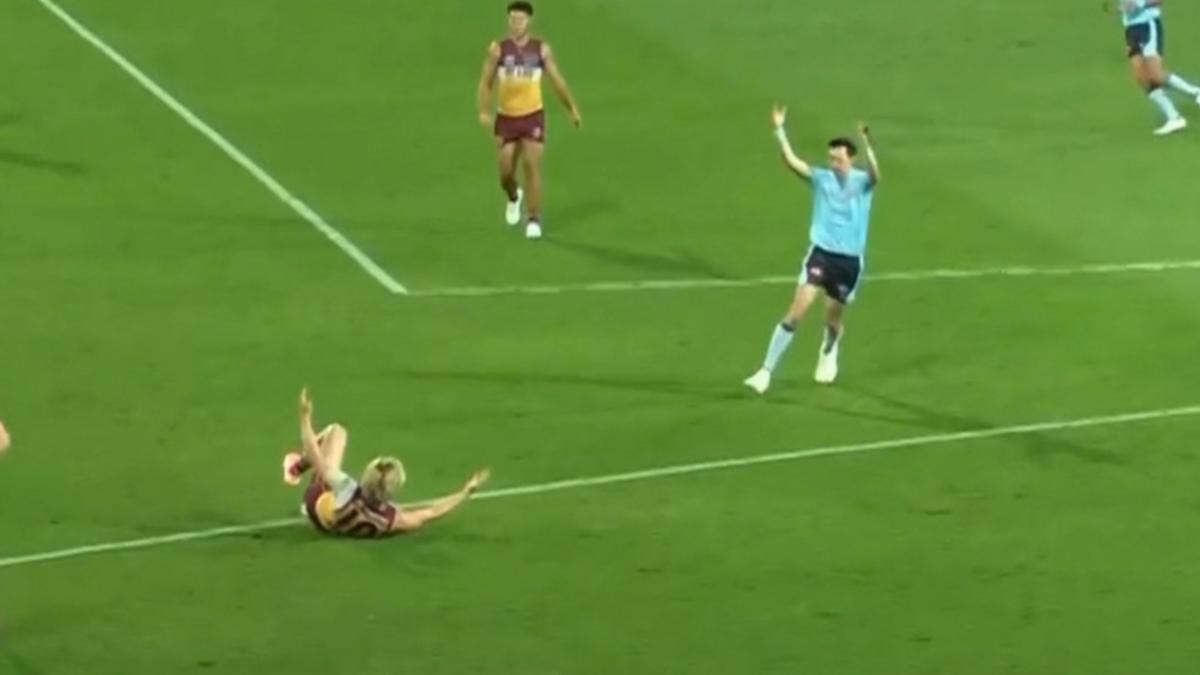 AFL umpire red-faced after being caught swearing at young gun