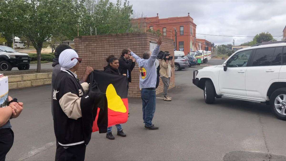 Dutton heckled by furious locals in town proposed for nuclear site