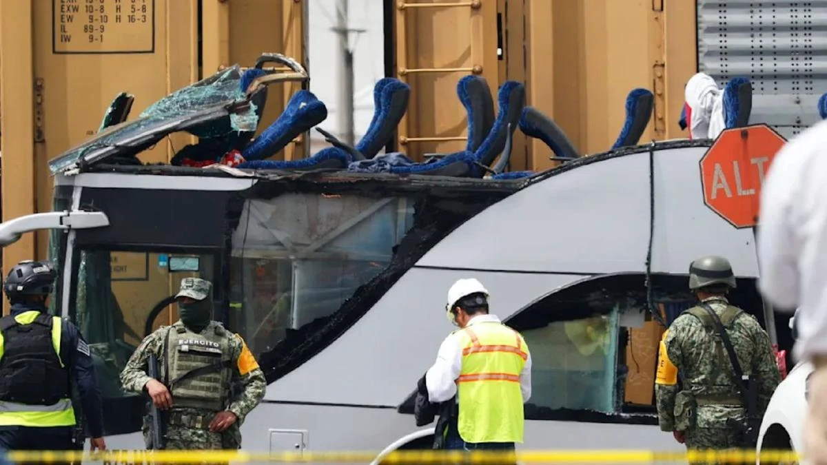 Ten killed and dozens hurt as train slams into bus at busy crossing