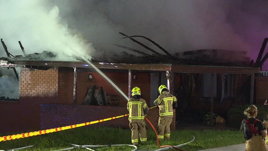 Two narrowly escape late-night blaze that destroys two-storey home