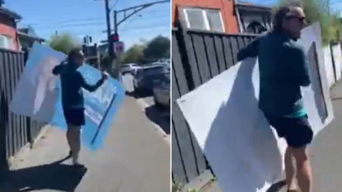 Teal MP’s husband caught on camera ripping down rival’s campaign poster