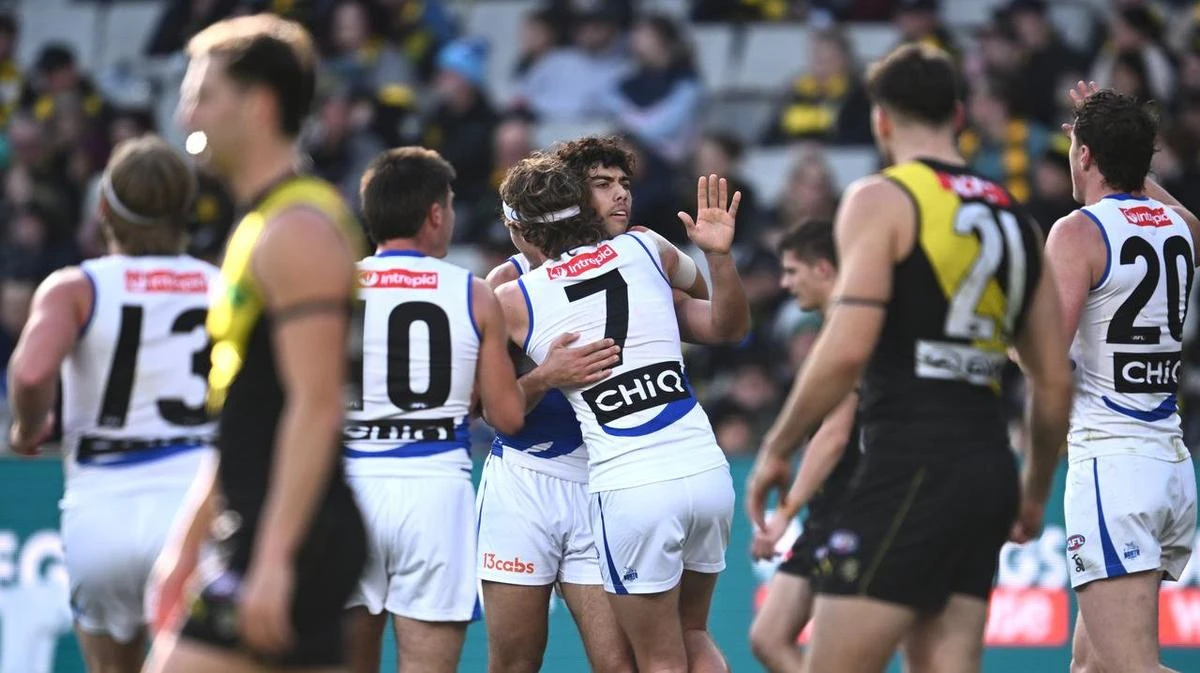 Roos move into wildcard spot after ugly win over Tigers