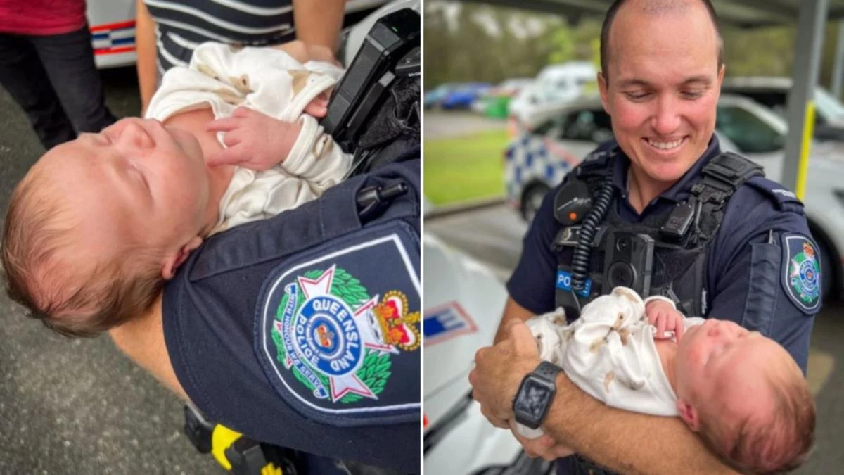 Baby Blake meets hero cops who helped him into the world
