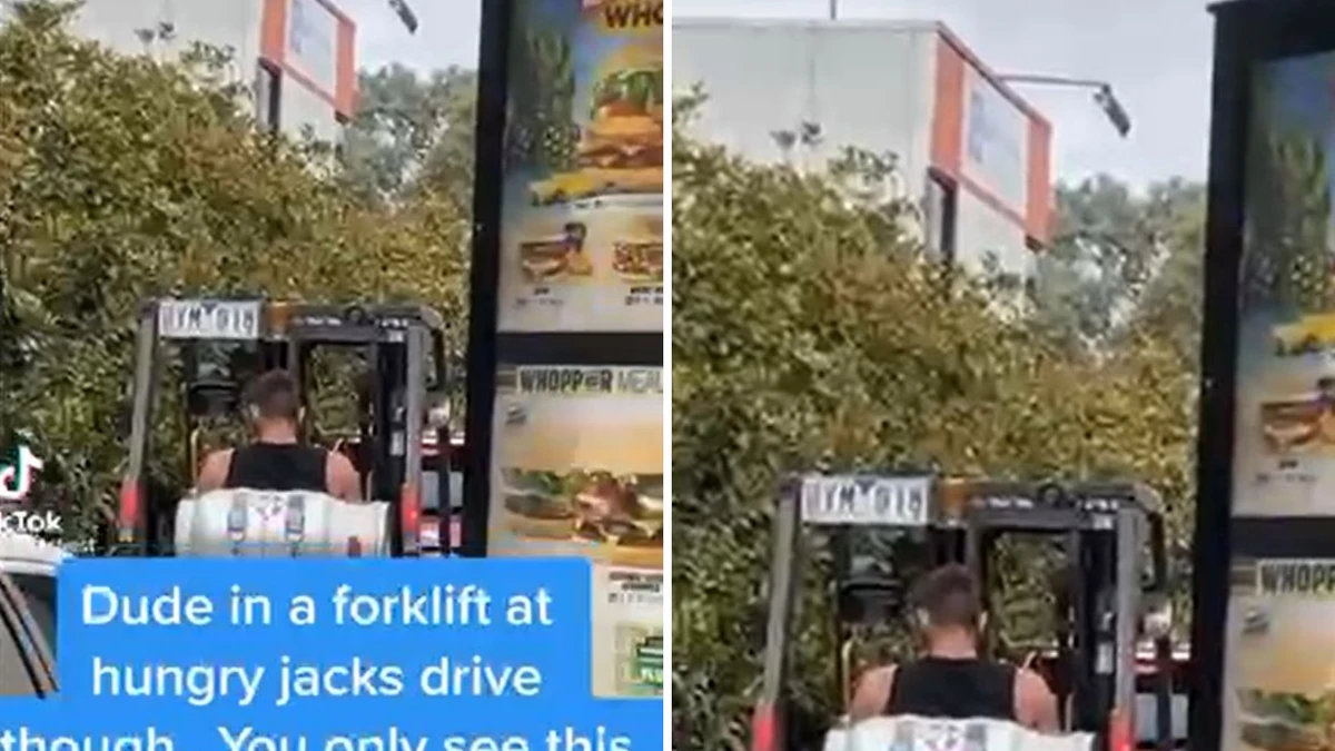 ‘Only in Australia’: Bizarre moment tradie drives A FORKLIFT through Hungry Jacks drive thru