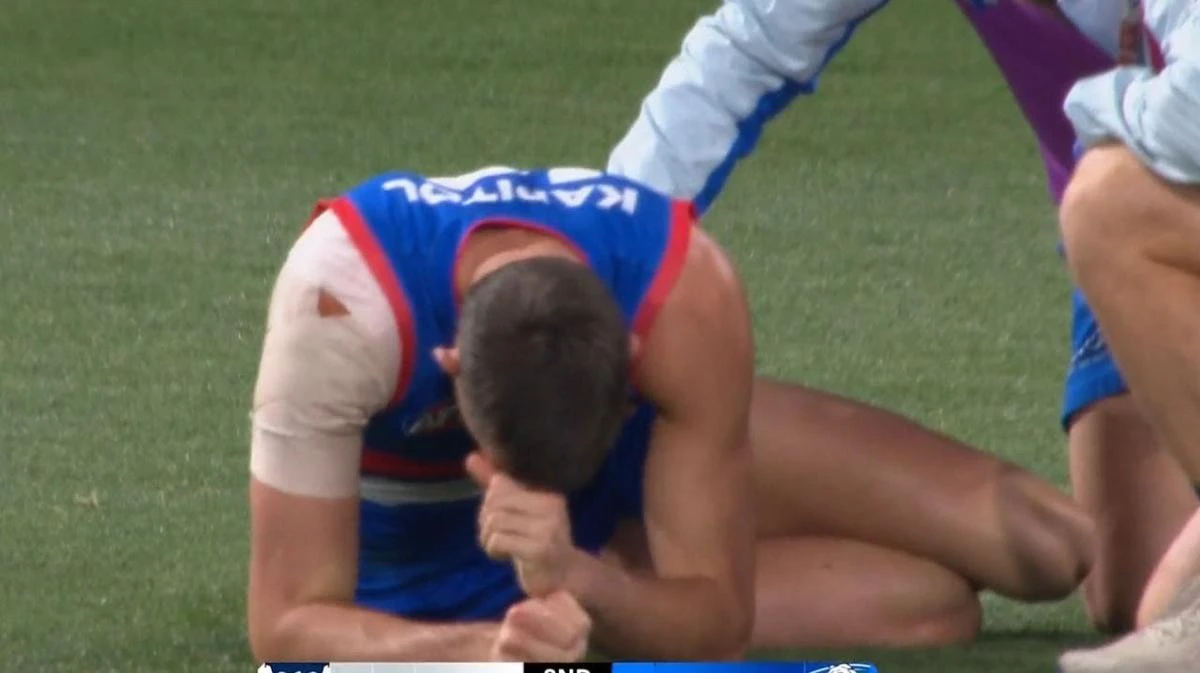 Distressing scenes as AFL superstar goes down with knee injury