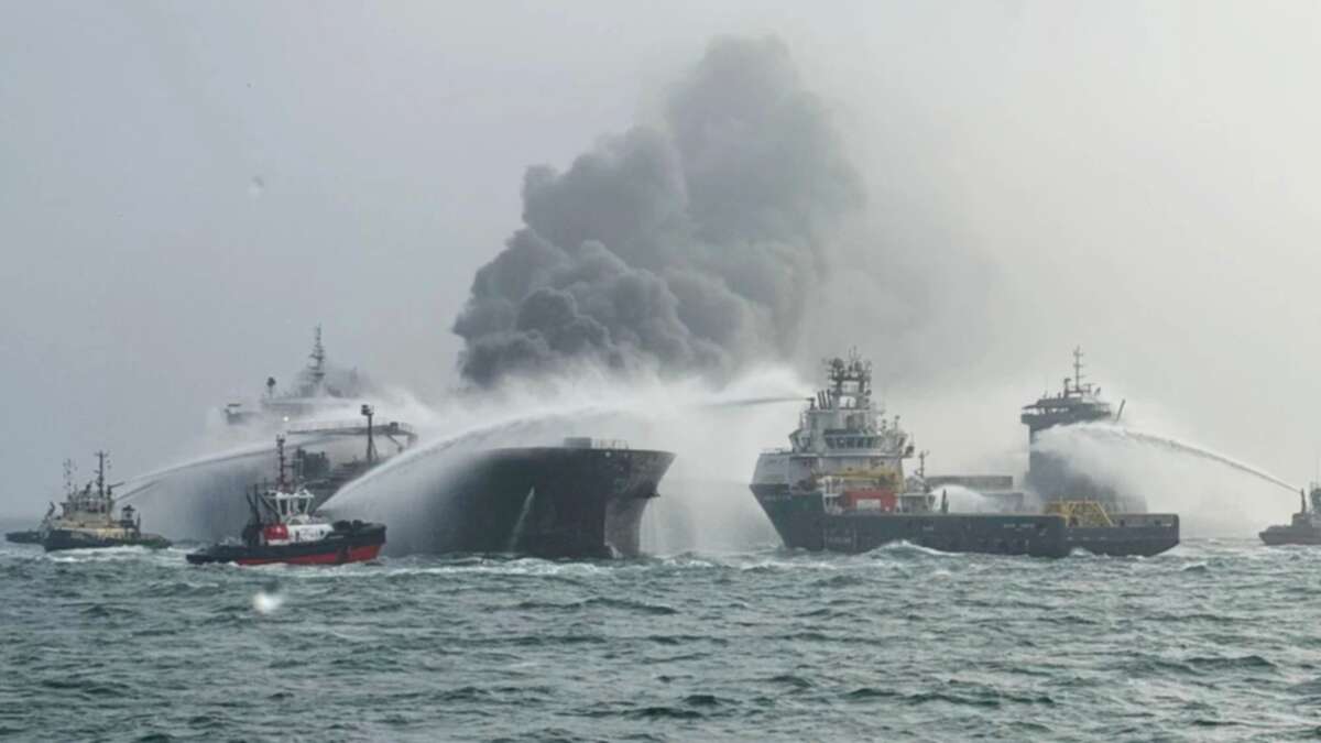 Tanker and cargo ship in fiery collision, triggering explosions and fuel leak