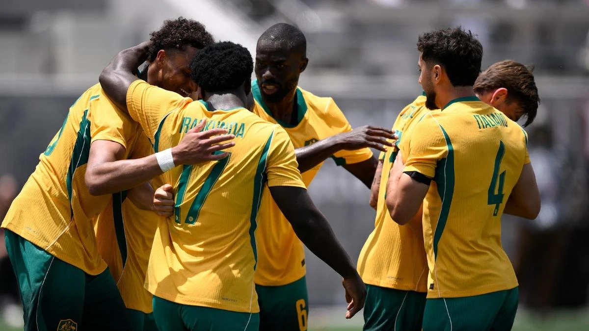 Socceroos coach ‘just happy’ as young side fights back against world No.19