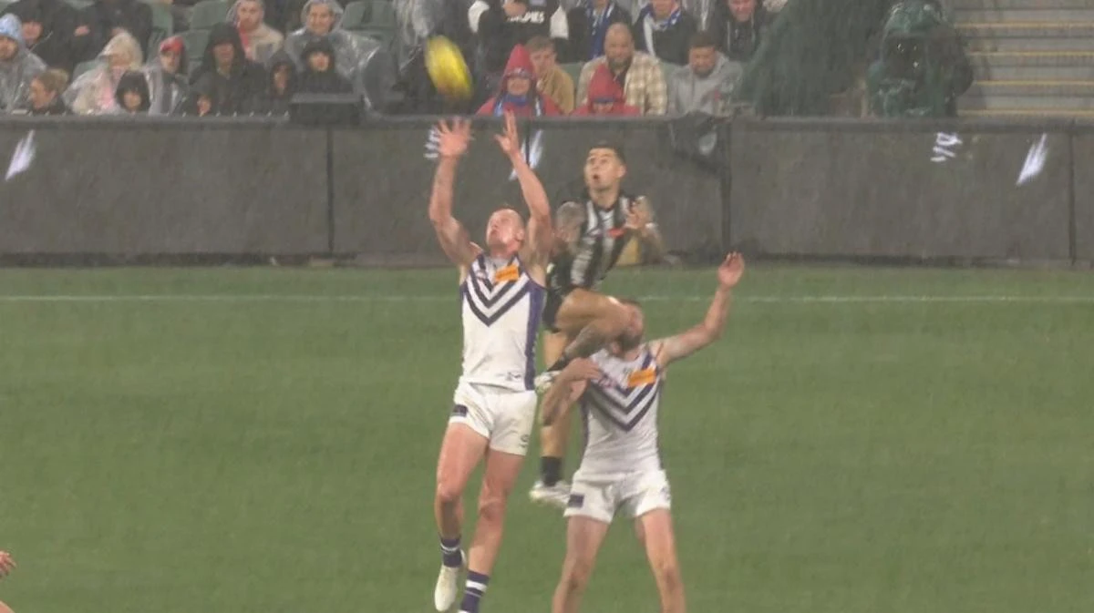 Fremantle hero takes game-saving mark in pouring rain