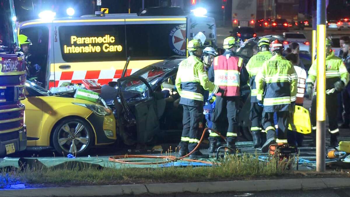 Two people trapped in horror multi-vehicle crash at Sydney intersection