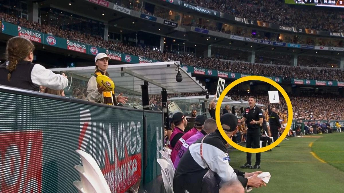 Collingwood coach busted as eagle-eyed fans spot sneaky act