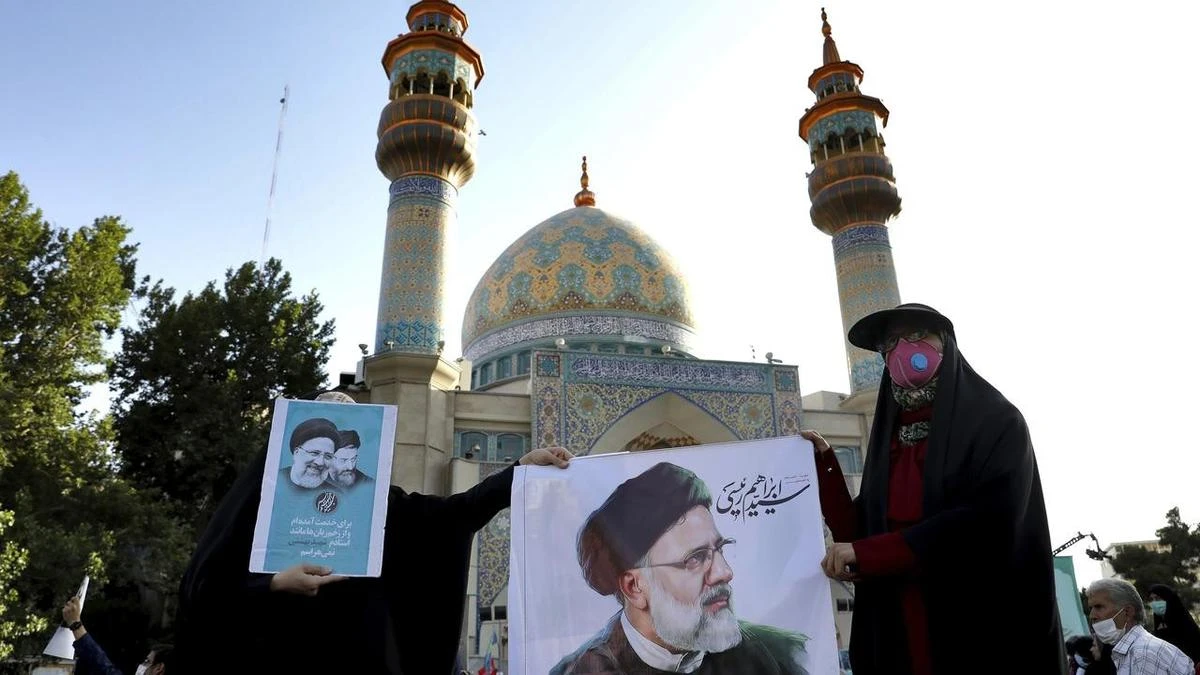 Iran votes, nuclear deal hangs in balance