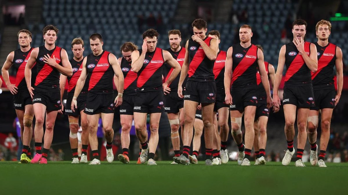 Premiership coach among 10 candidates on Essendon’s radar